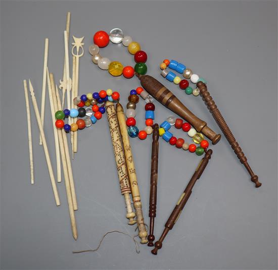 A quantity of bobbins and bone picks